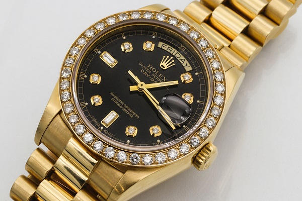 750 written on Rolex watch